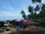 Two girls  sun  two Umbrellas